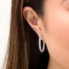 Thumbnail Image 1 of Alternating Ruby and 0.40 CT. T.W. Diamond Inside-Out Hoop Earrings in 10K White Gold