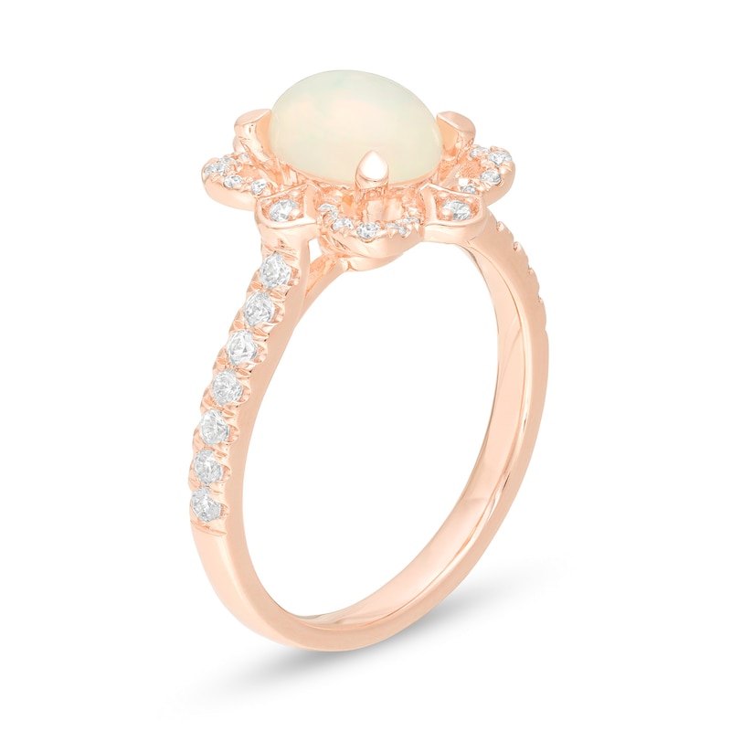 Oval Opal and 0.33 CT. T.W. Diamond Flower Frame Ring in 10K Rose Gold