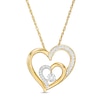Thumbnail Image 0 of 0.067 CT. T.W. Diamond Double Heart Pendant in 10K Gold