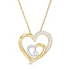 Thumbnail Image 1 of 0.067 CT. T.W. Diamond Double Heart Pendant in 10K Gold