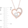0.067 CT. T.W. Diamond Double Heart Pendant in 10K Rose Gold