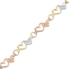 Thumbnail Image 0 of Interlocking Hearts Link Bracelet in 10K Tri-Tone Gold - 7.25"