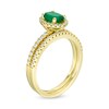 Thumbnail Image 3 of Oval Emerald and 0.33 CT. T.W. Diamond Frame Bridal Set in 14K Gold