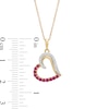 Ruby and 0.065 CT. T.W. Diamond Tilted Heart Pendant in 10K Gold