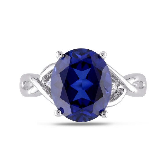 Oval Lab-Created Blue Sapphire and Diamond Accent Criss-Cross Split Shank Ring in Sterling Silver