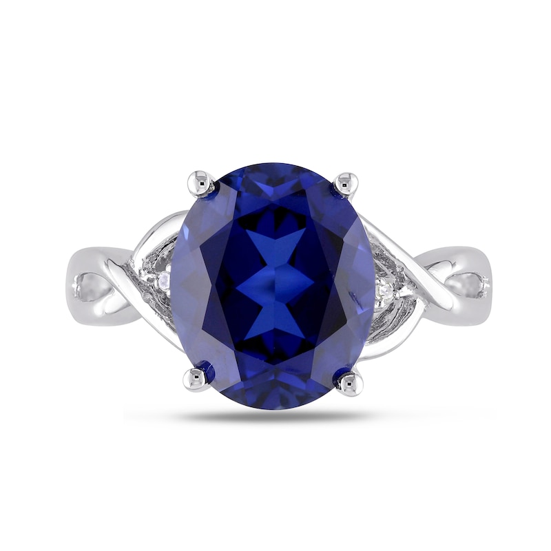 Oval Lab-Created Blue Sapphire and Diamond Accent Criss-Cross Split Shank Ring in Sterling Silver