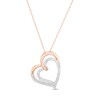 Thumbnail Image 0 of 0.085 CT. T.W. Diamond Double Tilted Heart Pendant in 10K Rose Gold