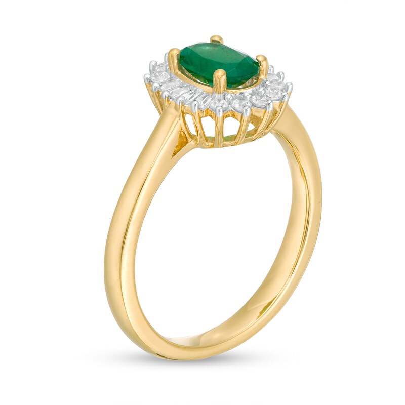 Oval Emerald and 0.20 CT. T.W. Baguette and Round Diamond Starburst Frame Ring in 10K Gold