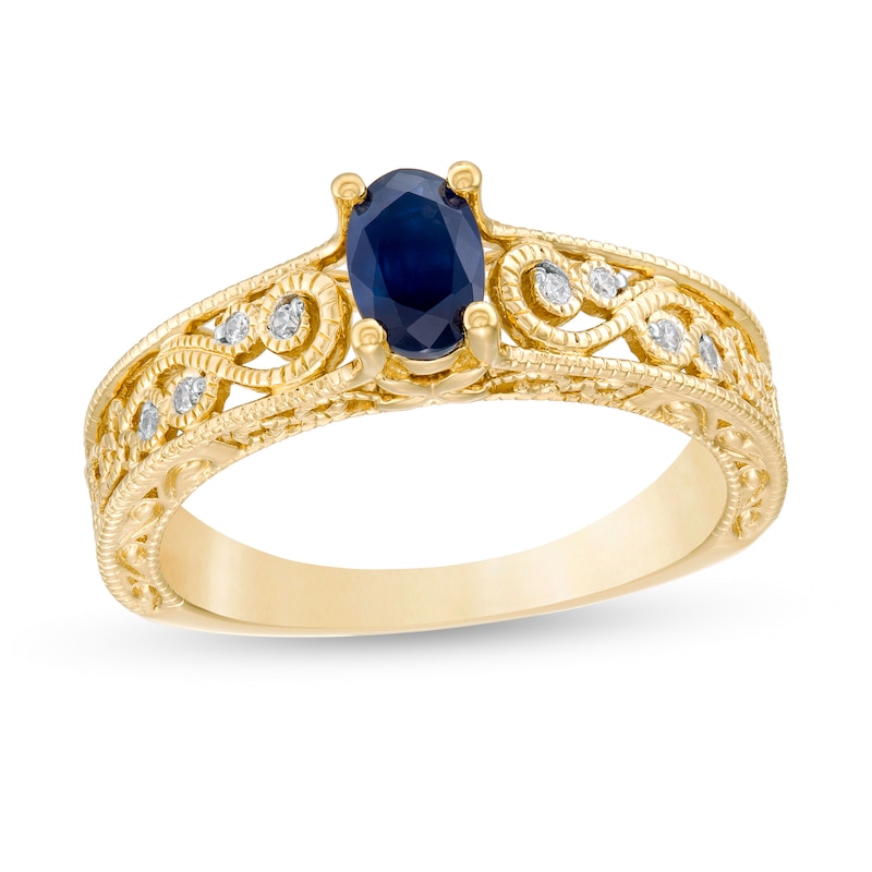 Oval Blue Sapphire and 0.05 CT. T.W. Diamond Scroll Open Shank Vintage-Style Ring in 10K Gold
