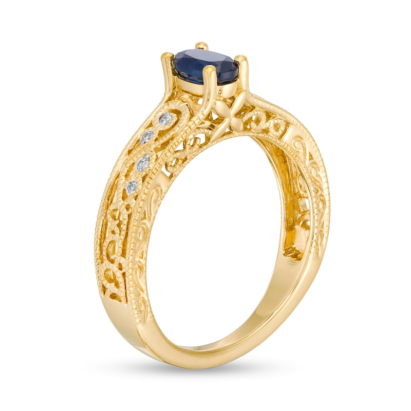 Oval Blue Sapphire and 0.05 CT. T.W. Diamond Scroll Open Shank Vintage-Style Ring in 10K Gold