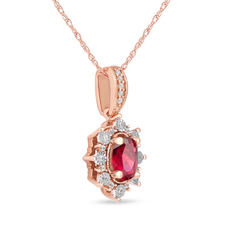 Main Image 2 of Oval Ruby and 0.08 CT. T.W. Diamond Sunburst Frame Vintage-Style Drop Pendant in 10K Rose Gold