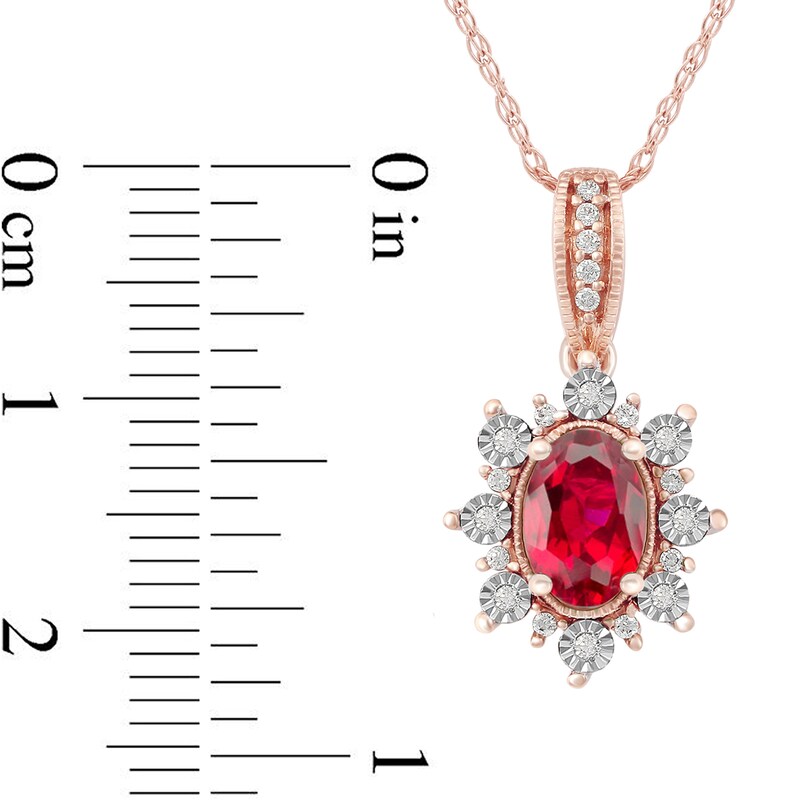 Main Image 4 of Oval Ruby and 0.08 CT. T.W. Diamond Sunburst Frame Vintage-Style Drop Pendant in 10K Rose Gold