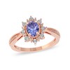 Thumbnail Image 0 of Oval Tanzanite and 0.10 CT. T.W. Diamond Sunburst Frame Vintage-Style Tapered Shank Ring in 10K Rose Gold