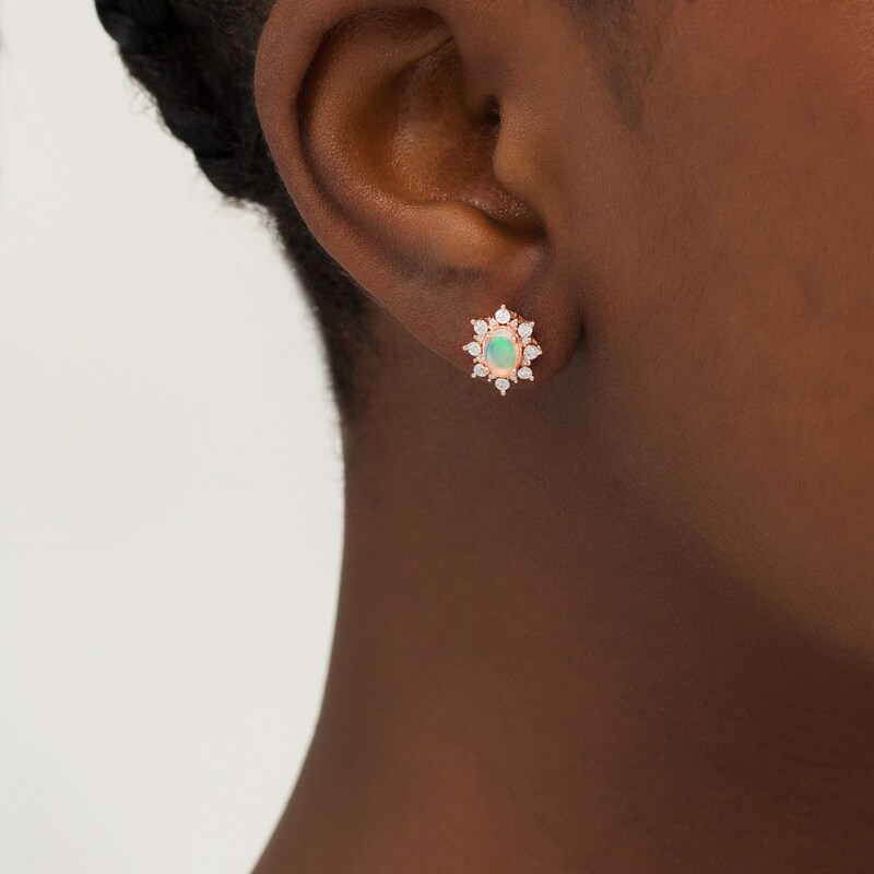 Main Image 2 of Oval Opal and 0.12 CT. T.W. Diamond Starburst Frame Vintage-Style Stud Earrings in 10K Rose Gold