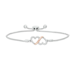 0.10 CT. T.W. Diamond Double Heart Loop Bolo Bracelet in Sterling Silver and 10K Rose Gold - 9.50&quot;