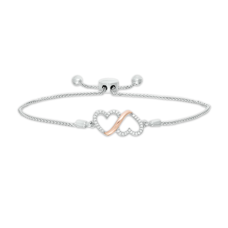Main Image 1 of 0.10 CT. T.W. Diamond Double Heart Loop Bolo Bracelet in Sterling Silver and 10K Rose Gold - 9.50"
