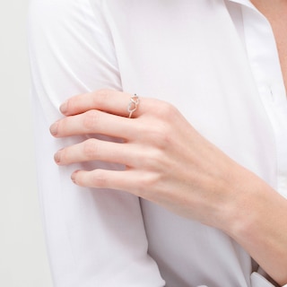 0.10 CT. T.W. Diamond Double Heart Loop Ring in Sterling Silver and 10K Rose Gold - Size 7