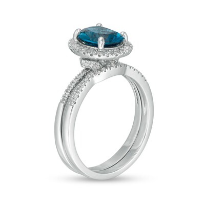 Oval London Blue Topaz and 0.31 CT. T.W. Diamond Frame Bridal Set in 14K White Gold