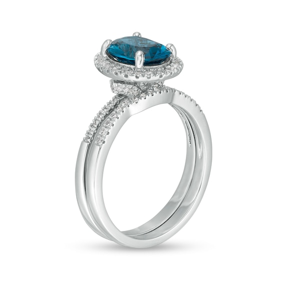 Oval London Blue Topaz and 0.31 CT. T.W. Diamond Frame Bridal Set in 14K White Gold