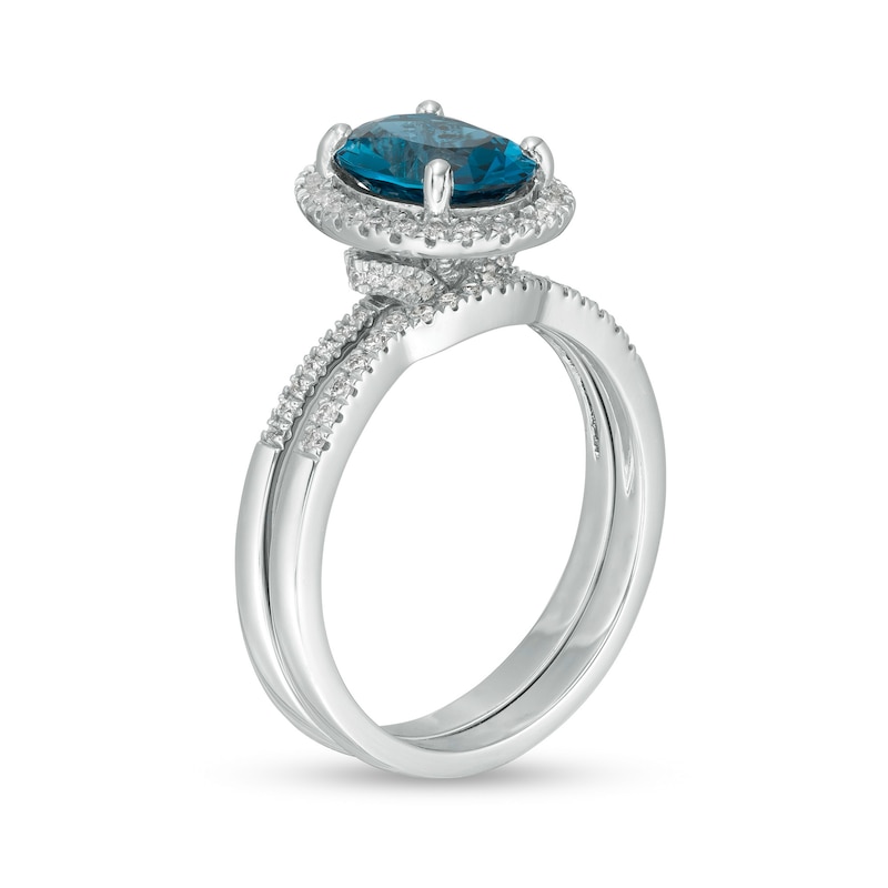 Oval London Blue Topaz and 0.31 CT. T.W. Diamond Frame Bridal Set in 14K White Gold