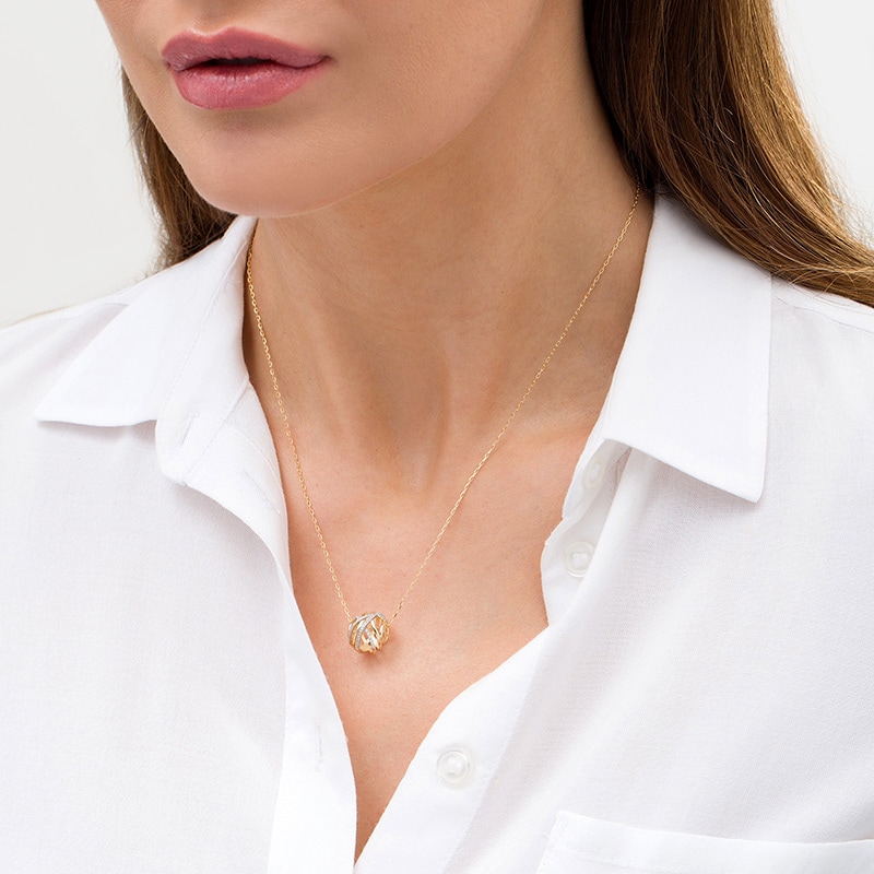 Main Image 2 of Wonder Woman™ Collection 0.07 CT. T.W. Diamond Themyscira Island Pendant in 10K Gold