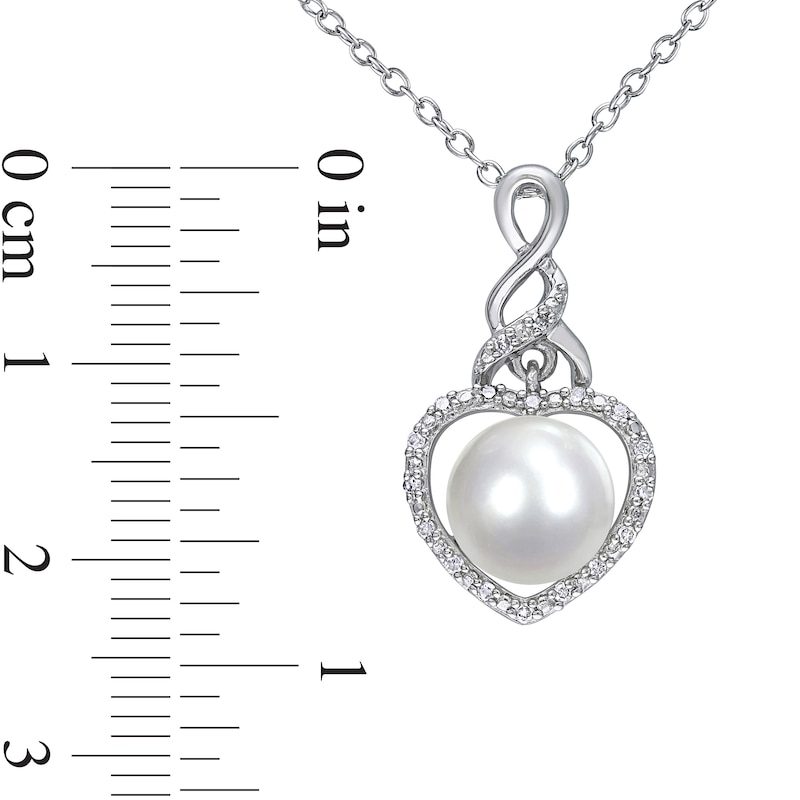 Button Cultured Freshwater Pearl and 0.07 CT. T.W. Diamond Heart Frame Cascading Twist Drop Pendant in Sterling Silver