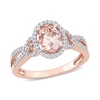 Thumbnail Image 1 of Oval Morganite and 0.19 CT. T.W. Diamond Frame Pointed Split Shank Buckle Ring in 14K Rose Gold