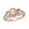 Oval Morganite and 0.34 CT. T.W. Diamond Frame Three Stone Split Shank Ring in 14K Rose Gold