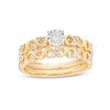 Thumbnail Image 0 of 0.23 CT. T.W. Diamond Infinity Bridal Set in 10K Gold