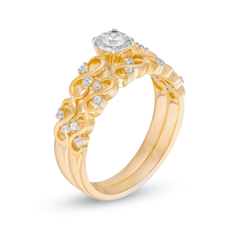 0.23 CT. T.W. Diamond Infinity Bridal Set in 10K Gold
