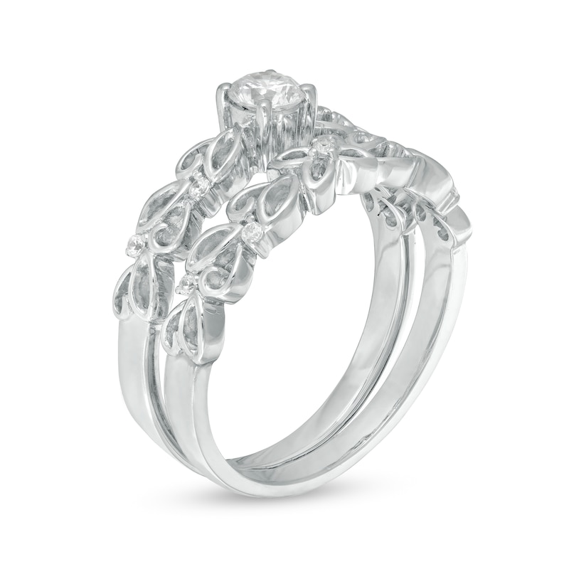 0.29 CT. T.W. Diamond Open Floral Bridal Set in 10K White Gold