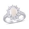Thumbnail Image 0 of Oval Opal, White Topaz and 0.10 CT. T.W. Diamond Starburst Frame Ring in Sterling Silver
