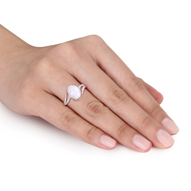 Oval Opal and 0.08 CT. T.W. Diamond Bypass Split Shank Ring in Sterling Silver