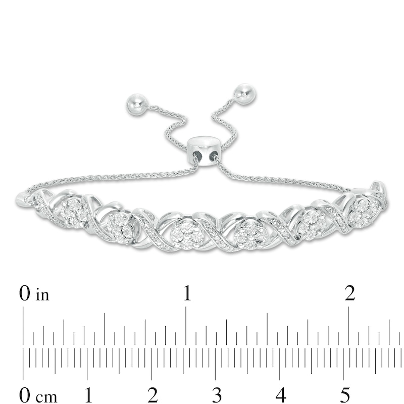 0.09 CT. T.W. Diamond Cascading Infinity with Flowers Bolo Bracelet in ...