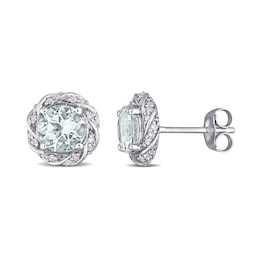 6.0mm Aquamarine and 0.19 CT. T.W. Diamond Swirl Frame Stud Earrings in 10K White Gold