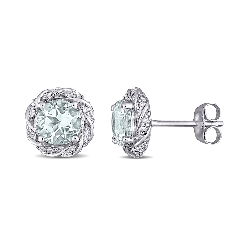 6.0mm Aquamarine and 0.19 CT. T.W. Diamond Swirl Frame Stud Earrings in 10K White Gold|Peoples Jewellers