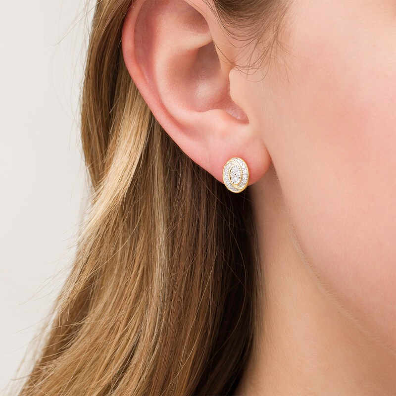 0.145 CT. T.W. Composite Diamond Oval Swirl Frame Stud Earrings in 10K Gold