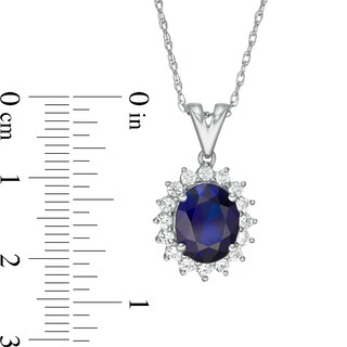 Oval Lab-Created Blue and White Sapphire Starburst Frame Pendant in Sterling Silver