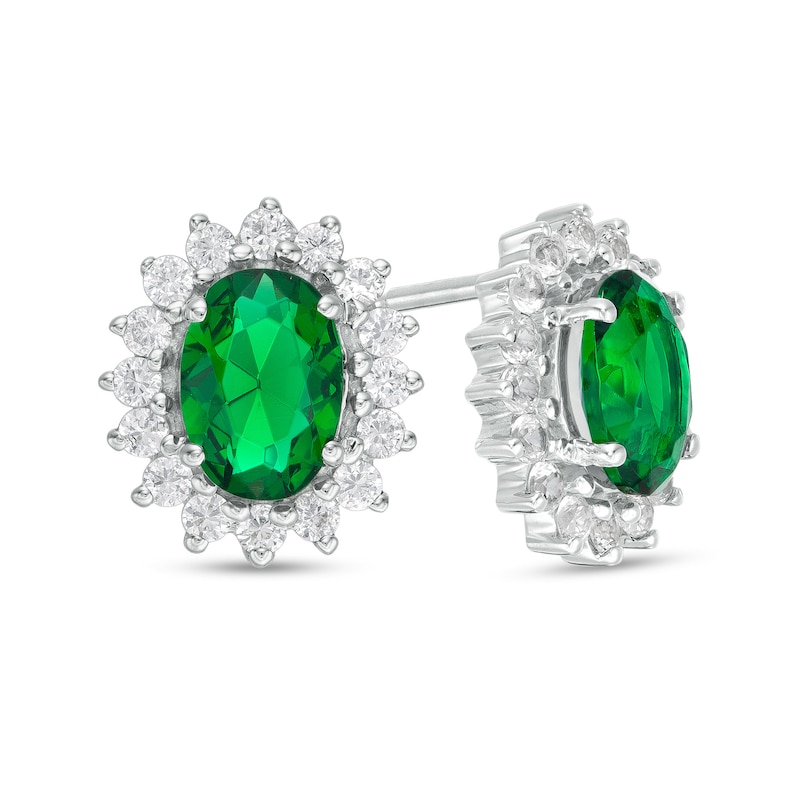 Oval Lab-Created Emerald and White Sapphire Starburst Frame Stud Earrings in Sterling Silver
