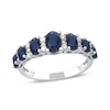 Thumbnail Image 0 of Oval Blue Sapphire and 0.15 CT. T.W. Diamond Graduated Seven Stone Alternating Trios Ring in 10K White Gold