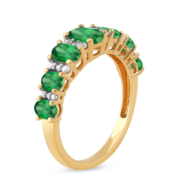 Oval Emerald and 0.13 CT. T.W. Diamond Graduated Seven Stone Alternating Trios Ring in 10K Gold