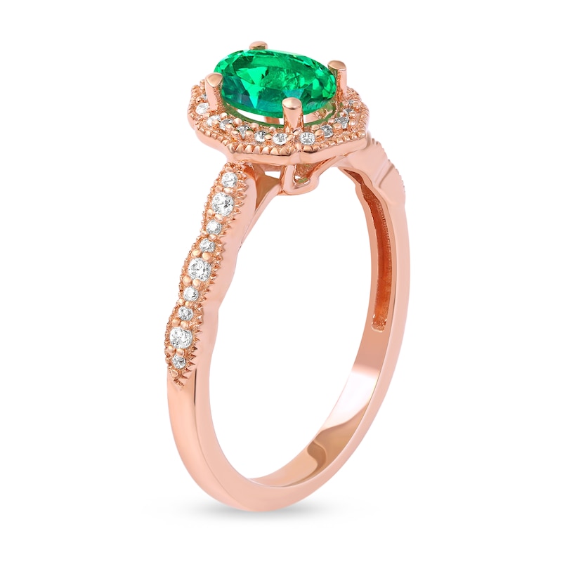 Oval Emerald and 0.16 CT. T.W. Diamond Quatrefoil Frame Vintage-Style Ring in 10K Rose Gold