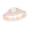 Thumbnail Image 1 of 4.5mm Lab-Created White Sapphire and 0.18 CT. T.W. Diamond Bridal Set in Sterling Silver with 14K Rose Gold Plate