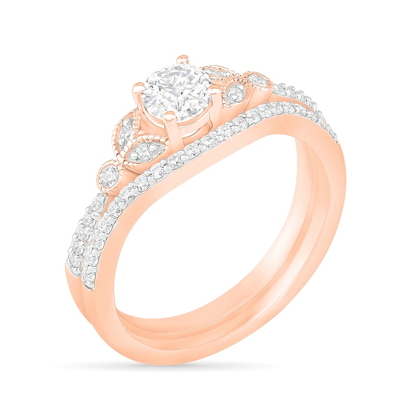 4.5mm Lab-Created White Sapphire and 0.18 CT. T.W. Diamond Bridal Set in Sterling Silver with 14K Rose Gold Plate