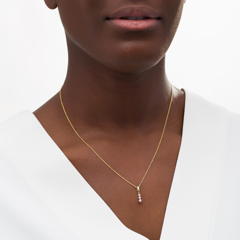 Main Image 2 of 0.085 CT. T.W. Diamond Linear Three Stone Pendant in 14K Gold