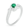 Thumbnail Image 1 of Oval Lab-Created Emerald and White Sapphire Bypass Frame Rolling Wave Ring in Sterling Silver