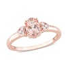 Thumbnail Image 0 of Oval Morganite and 0.05 CT. T.W. Diamond Trio Heart-Sides Ring in Sterling Silver with Rose Rhodium