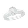 0.37 CT. T.W. Oval Diamond Double Frame Bridal Set in 10K Gold