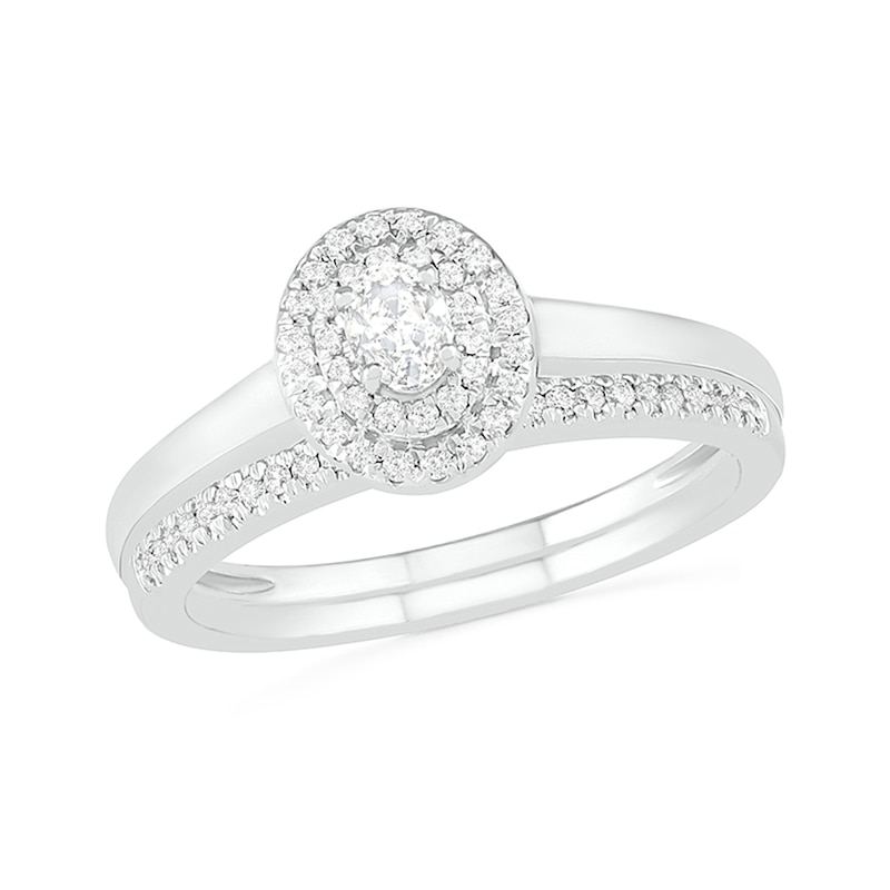 0.37 CT. T.W. Oval Diamond Double Frame Bridal Set in 10K Gold