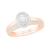 Thumbnail Image 0 of 0.37 CT. T.W. Oval Diamond Double Frame Bridal Set in 10K Rose Gold